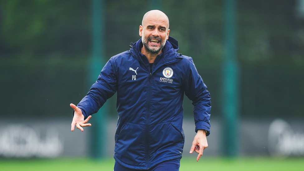 THE BOSS: Pep Guardiola gets his point across to the City players