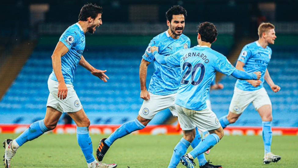 GLAD ALL OVER : Gundogan curls a delightful effort into the top corner in our 4-0 home win over Crystal Palace, three games after scoring against Chelsea. 