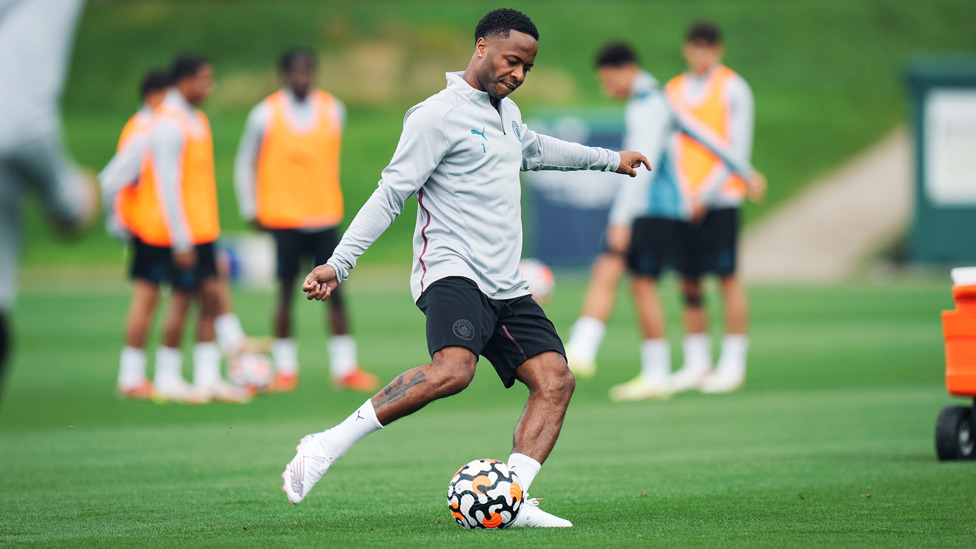 RAZZMATAZZ : Raheem Sterling puts his foot through the ball