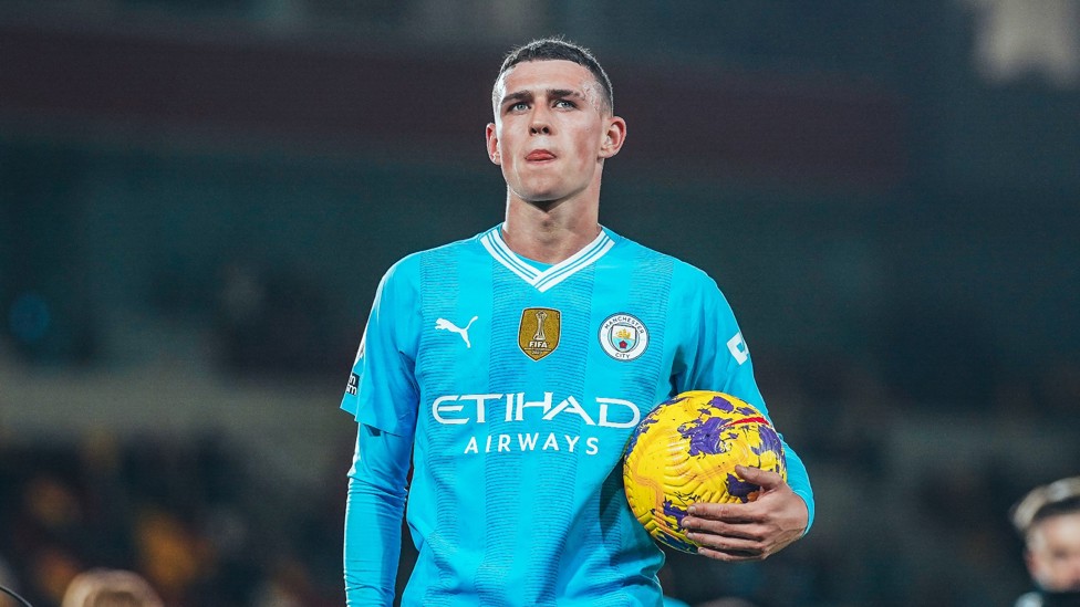 HAT-TRICK HERO : Phil Foden with one of two matchballs he earned in 2023/24