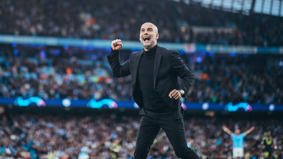 A MOMENT TO REMEMBER : Pep Guardiola celebrates the first of what would be four goals at the Etihad.