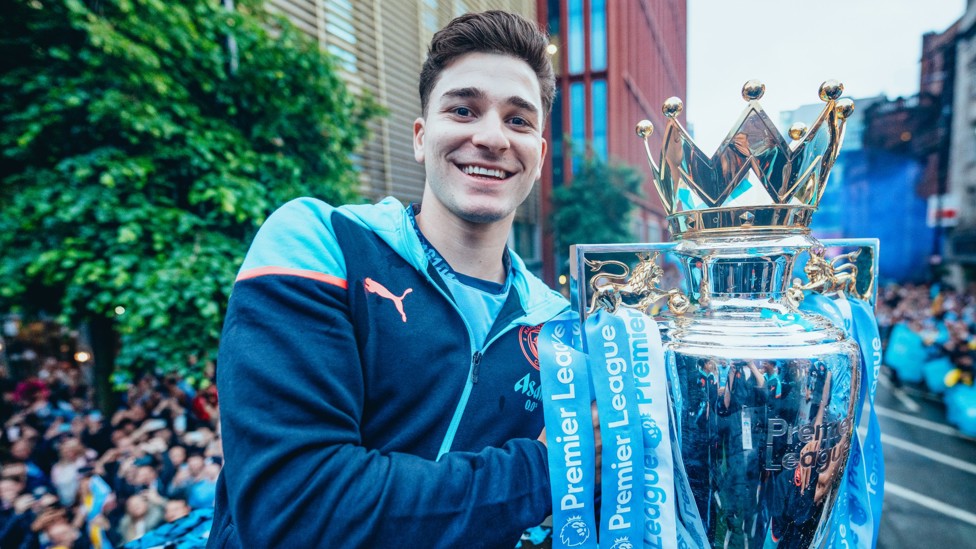 FOUR IN A ROW  : Alvarez with a second Premier League trophy and City's fourth in succession. 