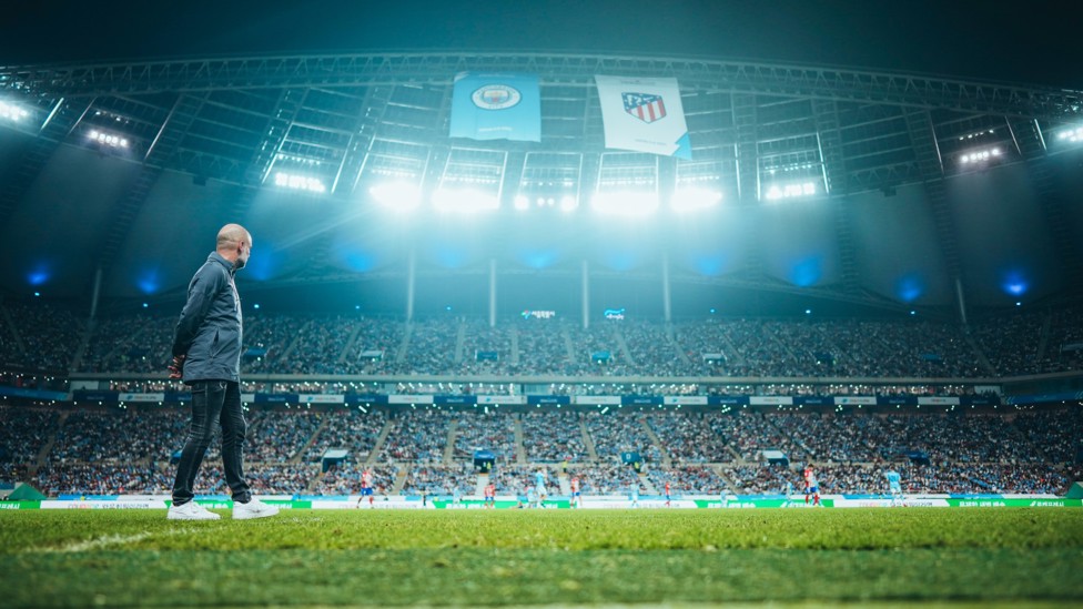 WATCHING BRIEF : Pep Guardiola looks on as City take on Sevilla in the UEFA Super Cup