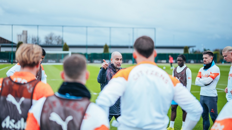 Listen up! The team gather for instructions