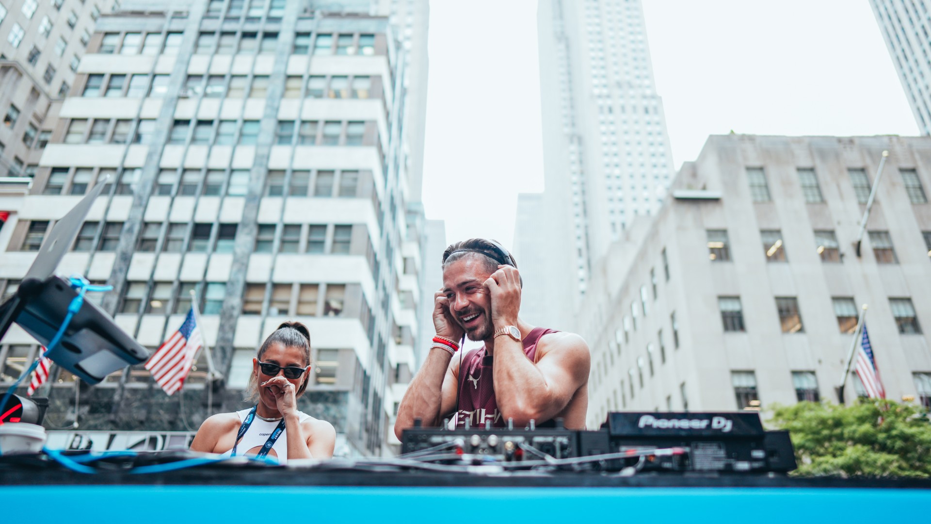 Man City star beam as he plays street basketball in New York in special outfit