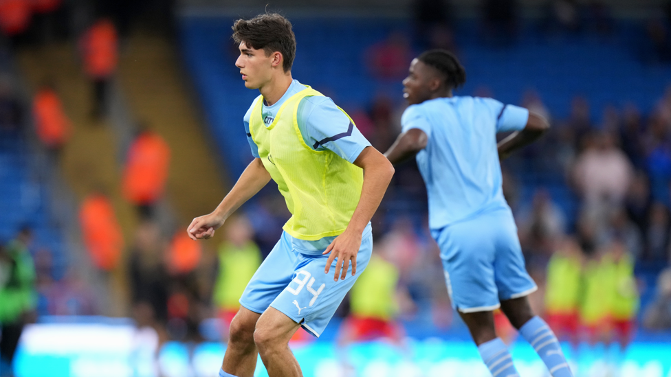 DEBUT INBOUND : Finley Burns warms-up ahead of his senior City debut.