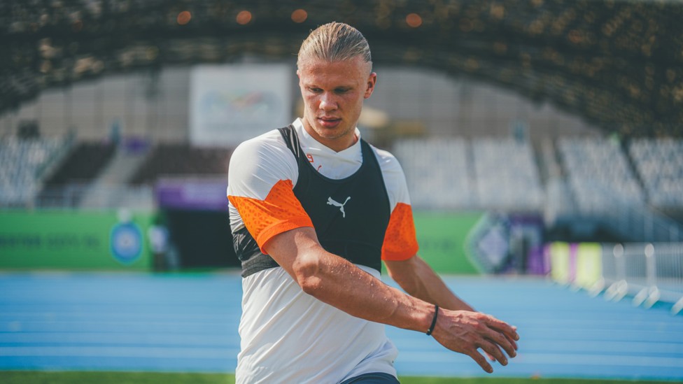 FULLY FOCUSED : The striker stretches out during a session in Jeddah