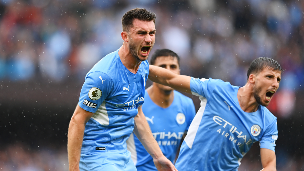 PASSION : Aymeric Laporte roars as he scores City's third of the afternoon. 