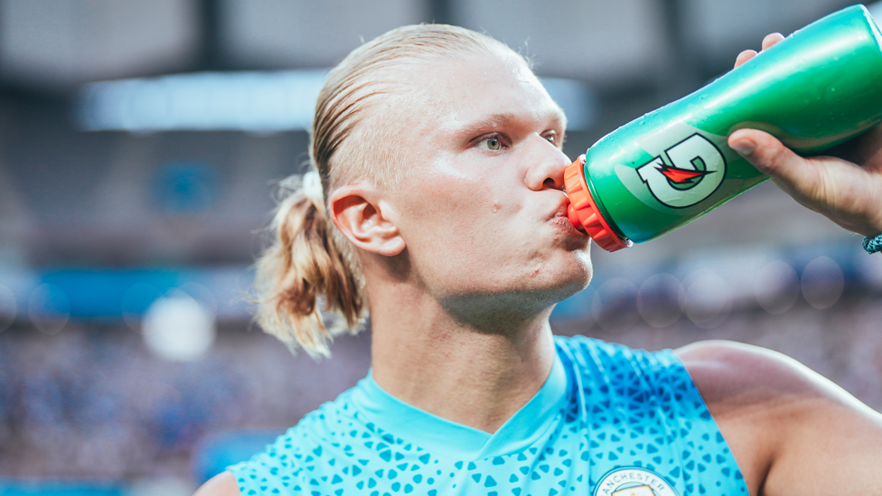 THIRSTY WORK: Erling Haaland takes a well earned breather