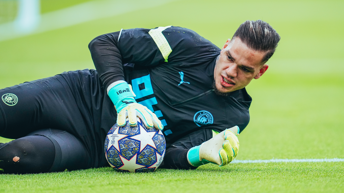 SAFE HANDS: Ederson gets a feel of the ball during the pre-match warm up.