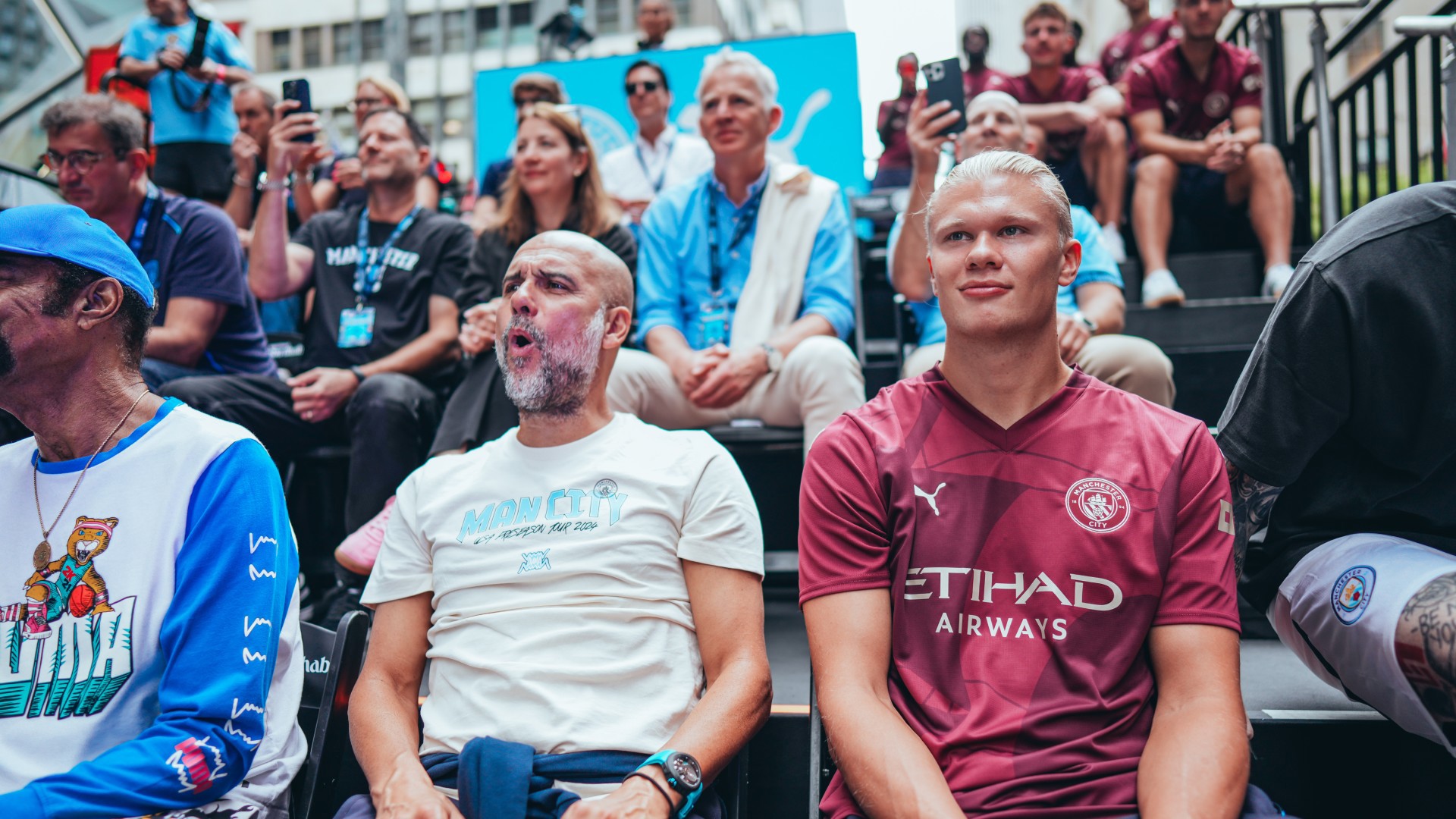 Man City star beam as he plays street basketball in New York in special outfit