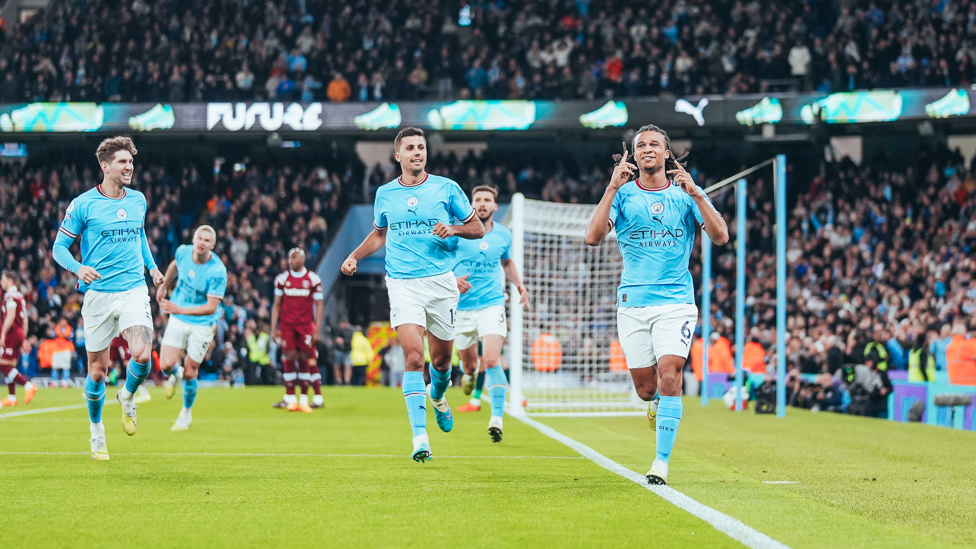 ALL SMILES : The players show their delight after the splendid header.