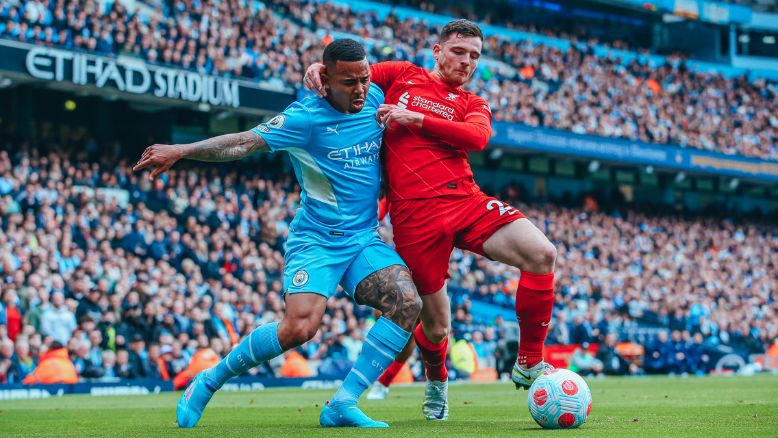 TUSSLE: Jesus and Robertson fight for possession.