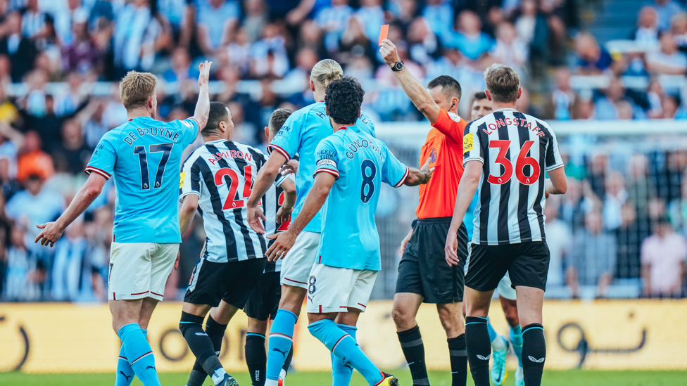 VAR : Trippier is shown red, but the referee downgrades it to a yellow after an on-field review.