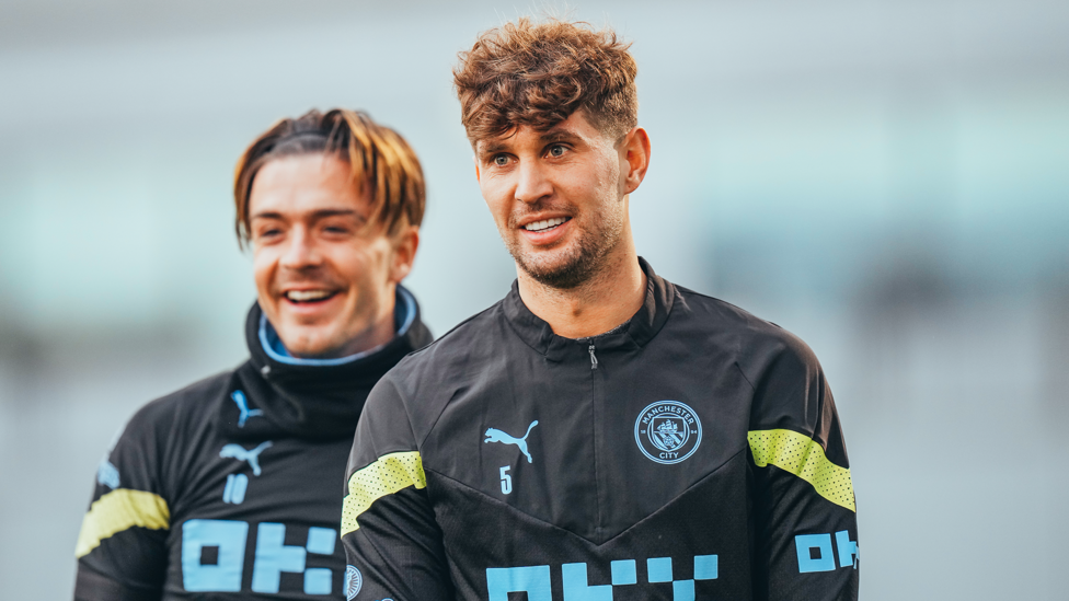 BEAMING DUO : John Stones and Jack Grealish in good spirits ahead of matchday