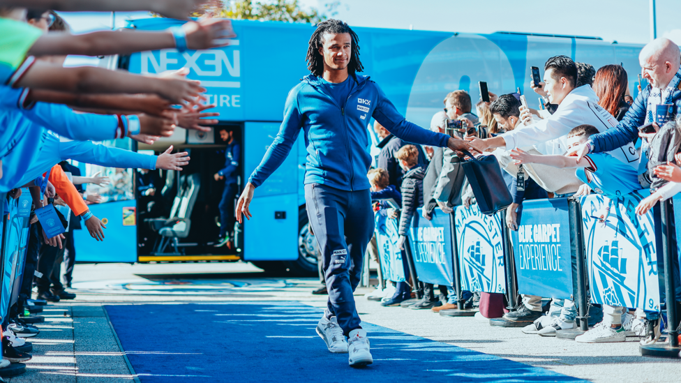 HANDSH-AKE : Nathan greets the fans as he strolls into the stadium.