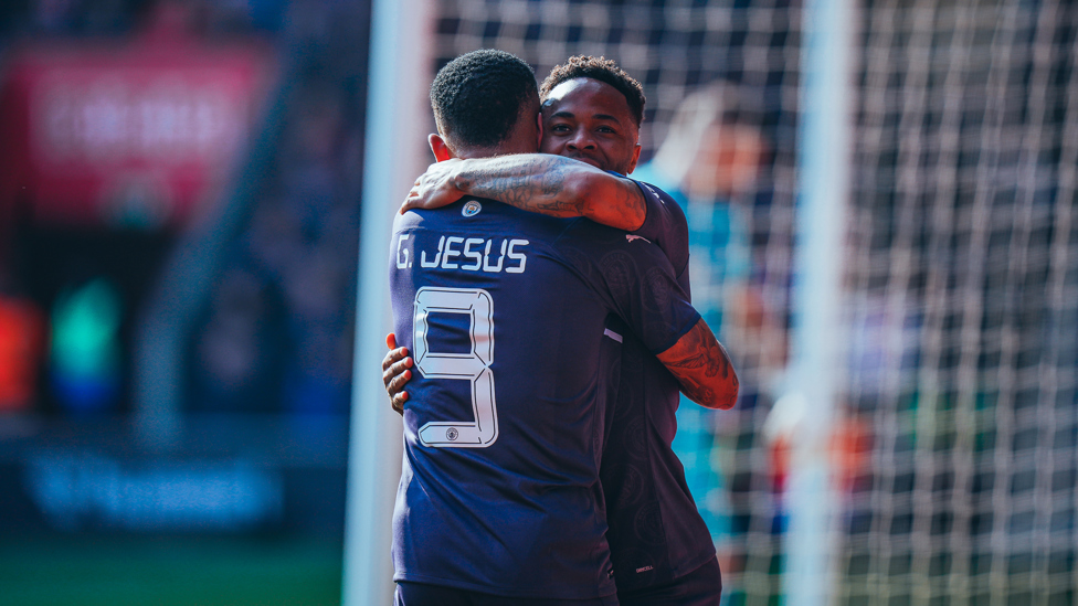 SCORER + PROVIDER : Gabby and Raheem celebrate our opener. 