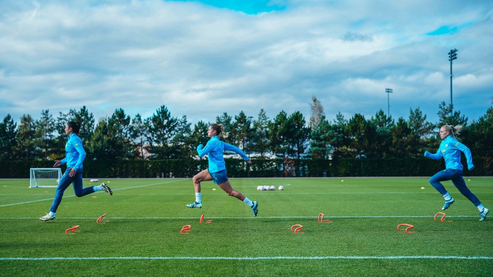 LEAPS AND BOUNDS : City's defenders striding over hurdles. 