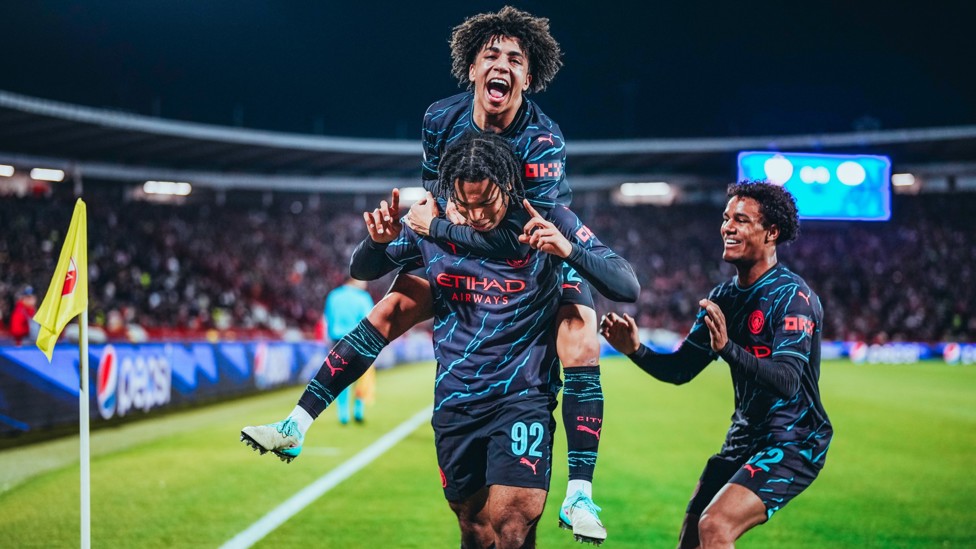 WHAT A MOMENT : Micah Hamilton scores on his UCL debut - surrounded here by fellow academy graduates Rico Lewis and Oscar Bobb