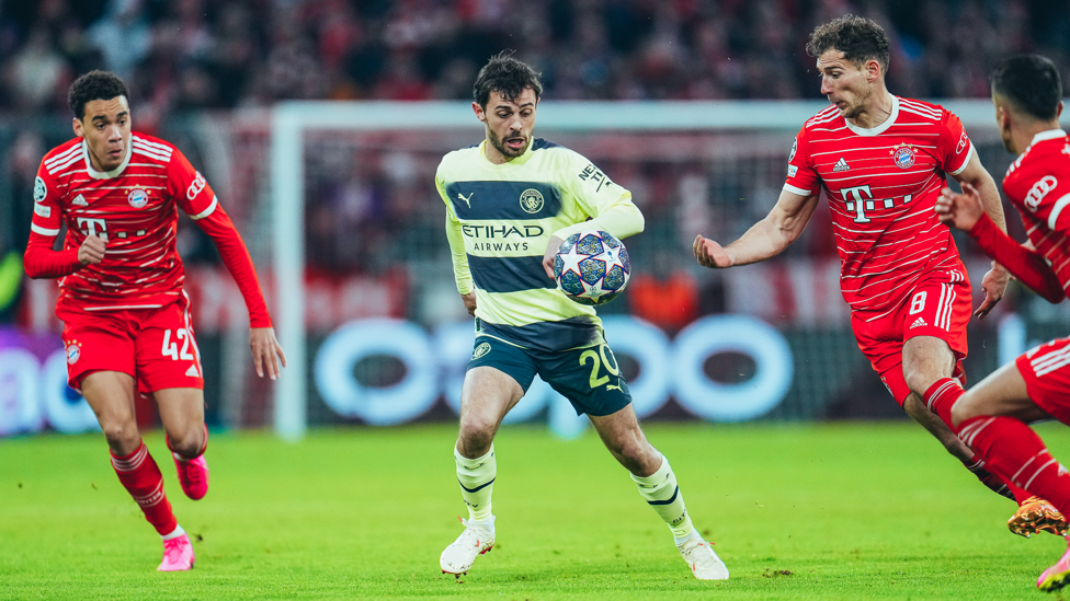 BATTLING BERNARDO : Our Portuguese magician looks to maintain possession when surrounded by Bayern bodies.