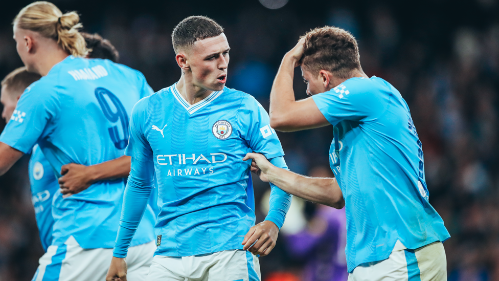 DEADLY DUO : Foden celebrates with Alvarez.