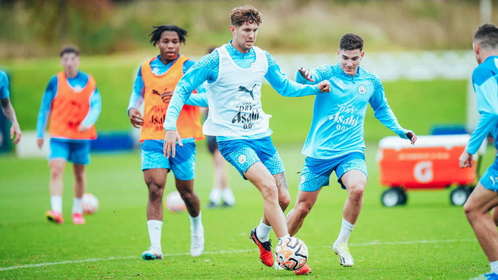 STONE WALL : John Stones retrieves possession.