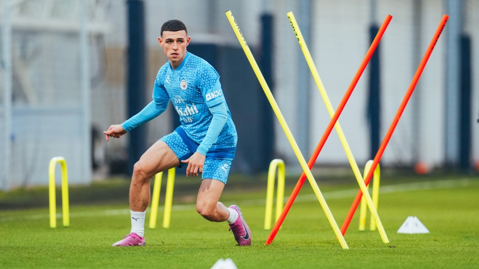 SLALOM : Phil Foden flaunts his agility during a dodge and weave drill.