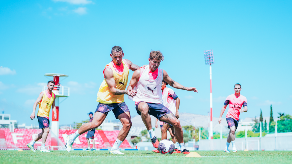 TOUCH TIGHT : Kalvin Phillips and John Stones in the heat of the action