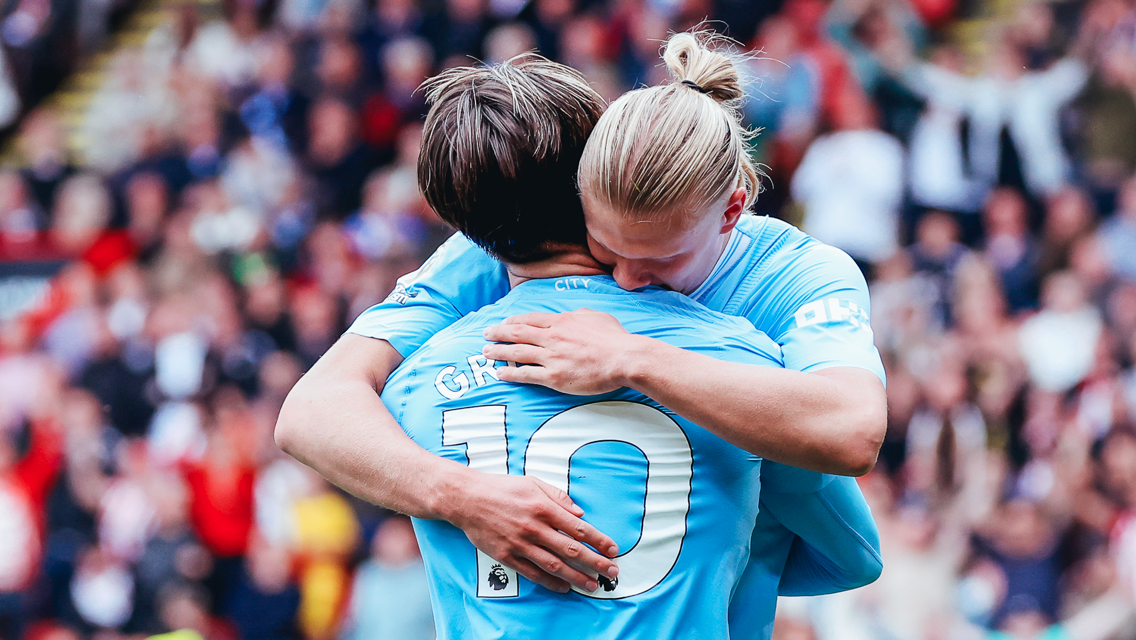 HAALAND HUG: Our number nine shares the love with Grealish!