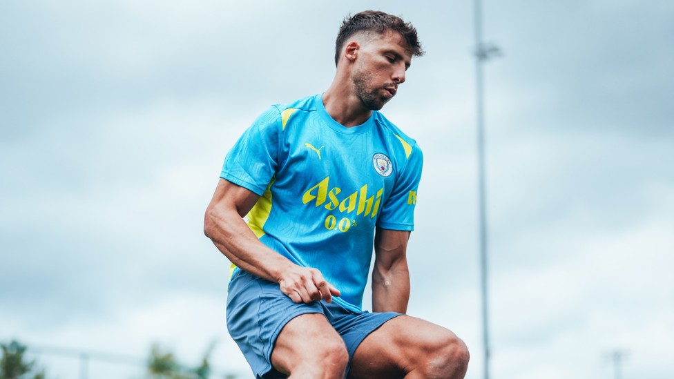 SLALOM : Ruben Dias glides round the training poles. 