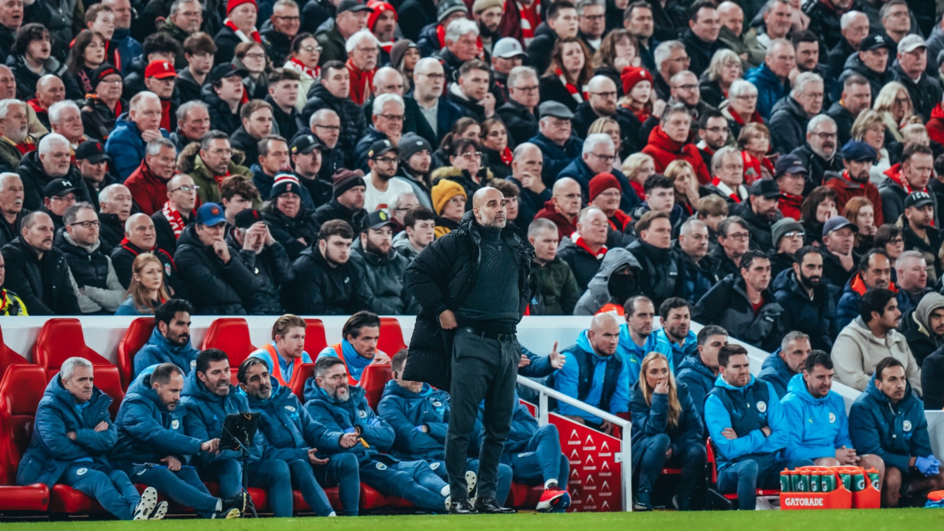 WATCHING BRIEF: Pep Guardiola looks on during Sunday's clash.