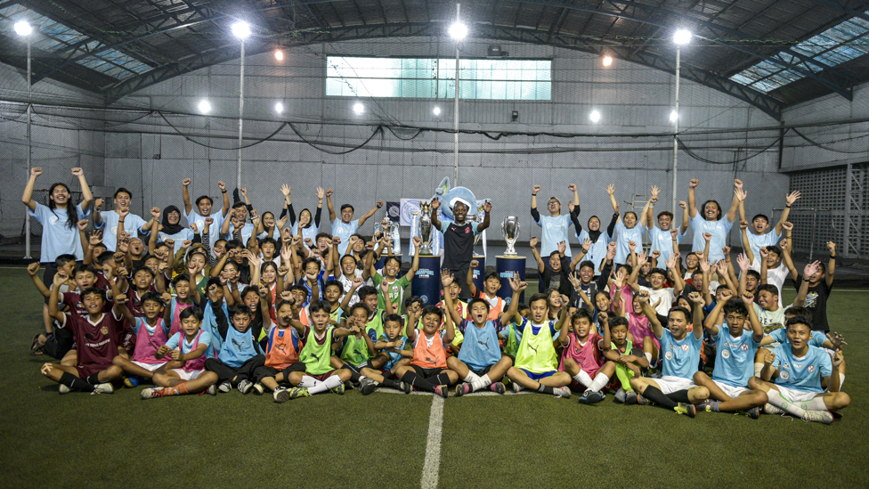 YOUNG LEADERS : Shaun Wright-Phillips visits a community football session led by young community coaches.