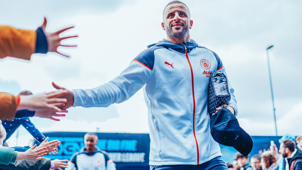 SKIPPER : Walker greets the fans on his way into the stadium.