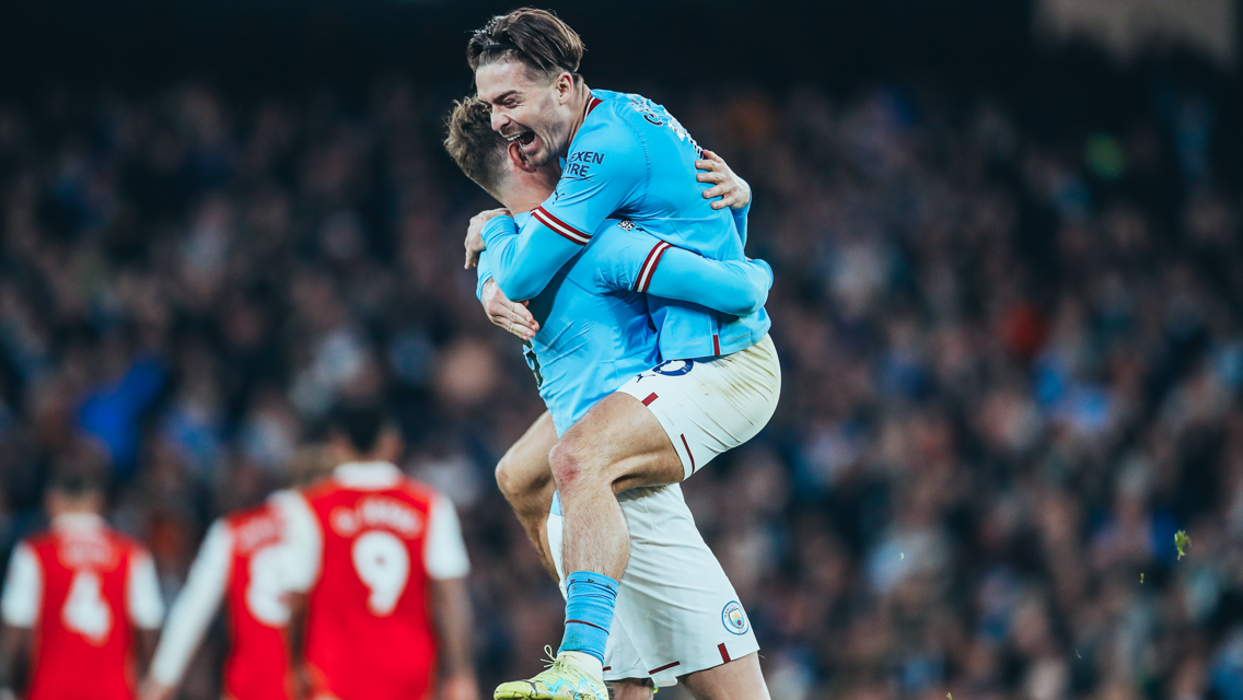 BEAR HUG: Stones feels the love from Grealish!