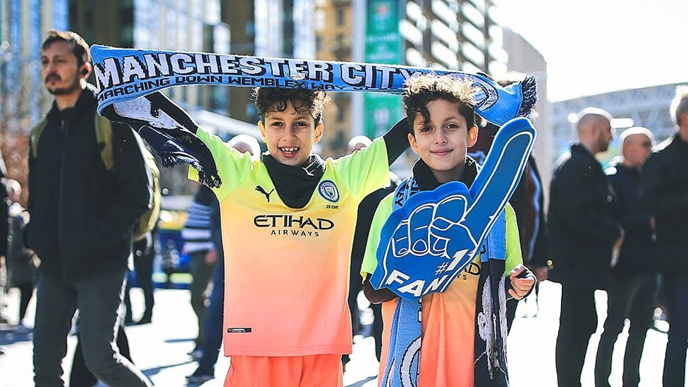 HAND IT TO CITY: Our recent Carabao Cup final trip to Wembley was the perfect chance to dress for the occasion for these two young fans