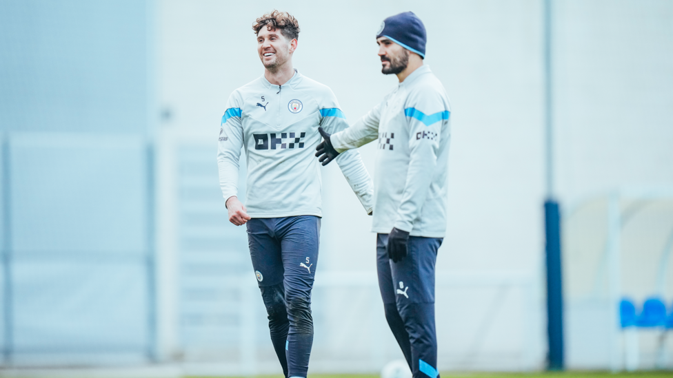 DYNAMIC DUO : John Stones and Ilkay Gundogan limber up