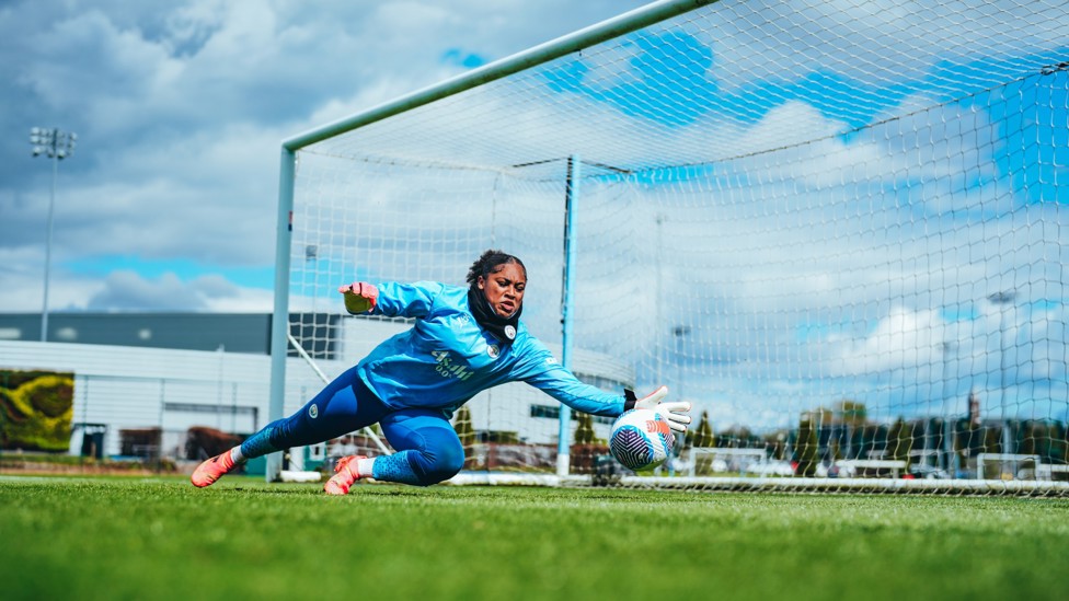 GREAT SAVE  : Khiara Keating makes a strong save.