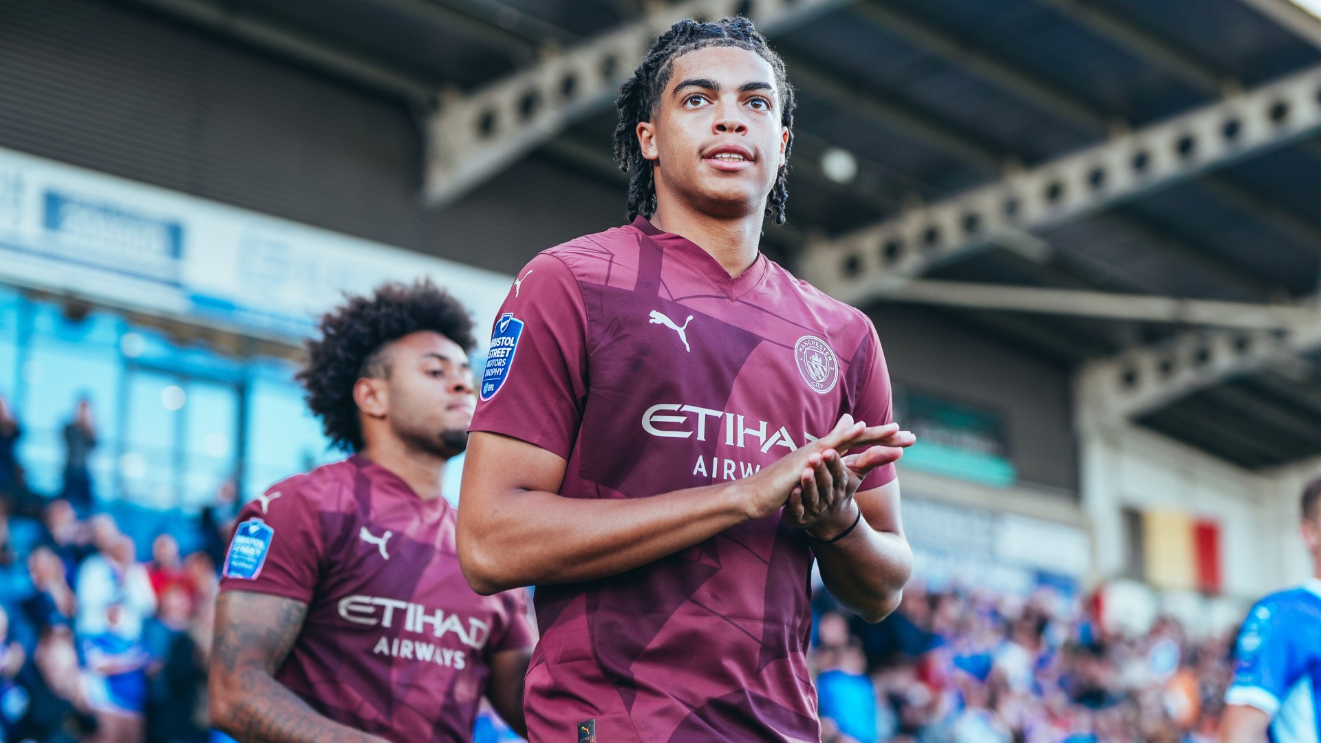 TAKING CENTRE STAGE : Jahmai Simpson-Pusey and his team-mates head out onto the pitch. 