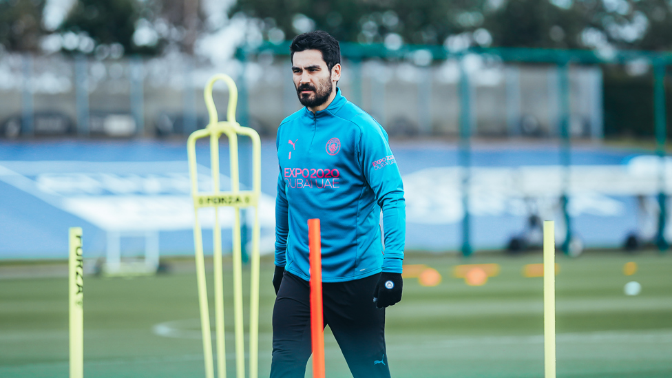 GLOVED UP : Ilkay Gundogan wraps up warm at the CFA