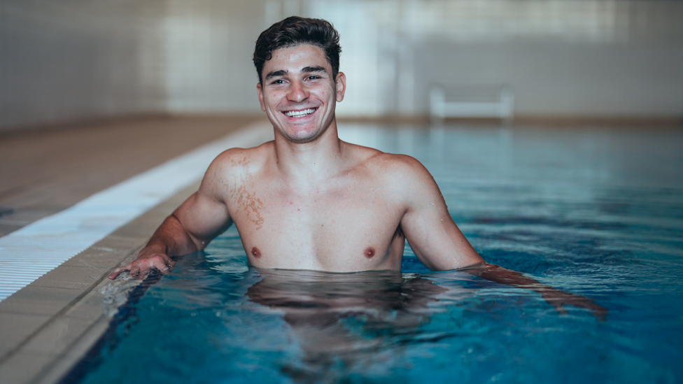 SWIMMING SUCCESS : Julian Alvarez recovers in the pool