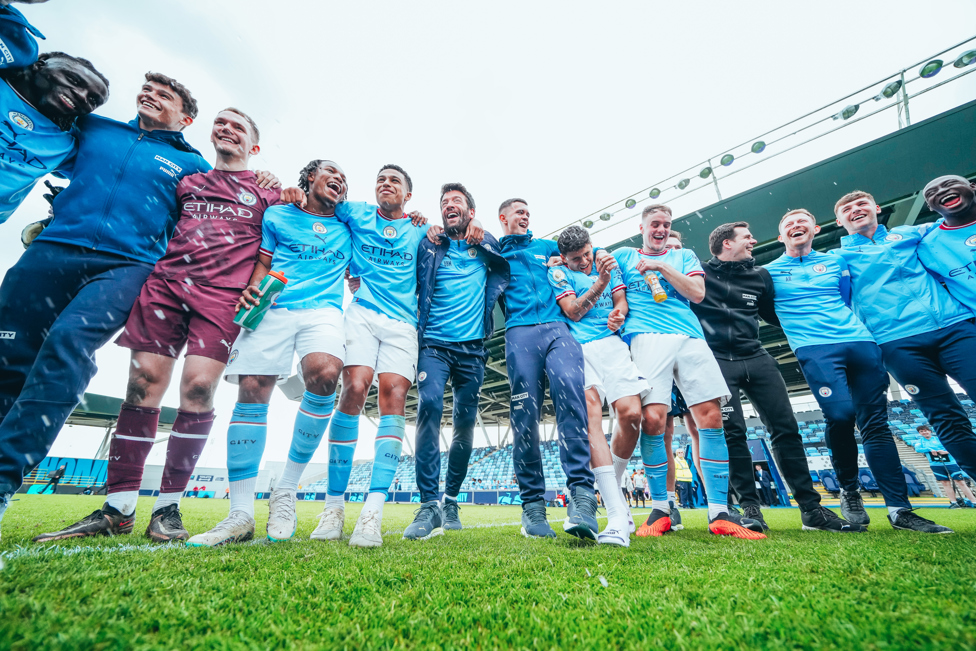 ONE TEAM : Lots of happy faces as we celebrate a third consecutive title.