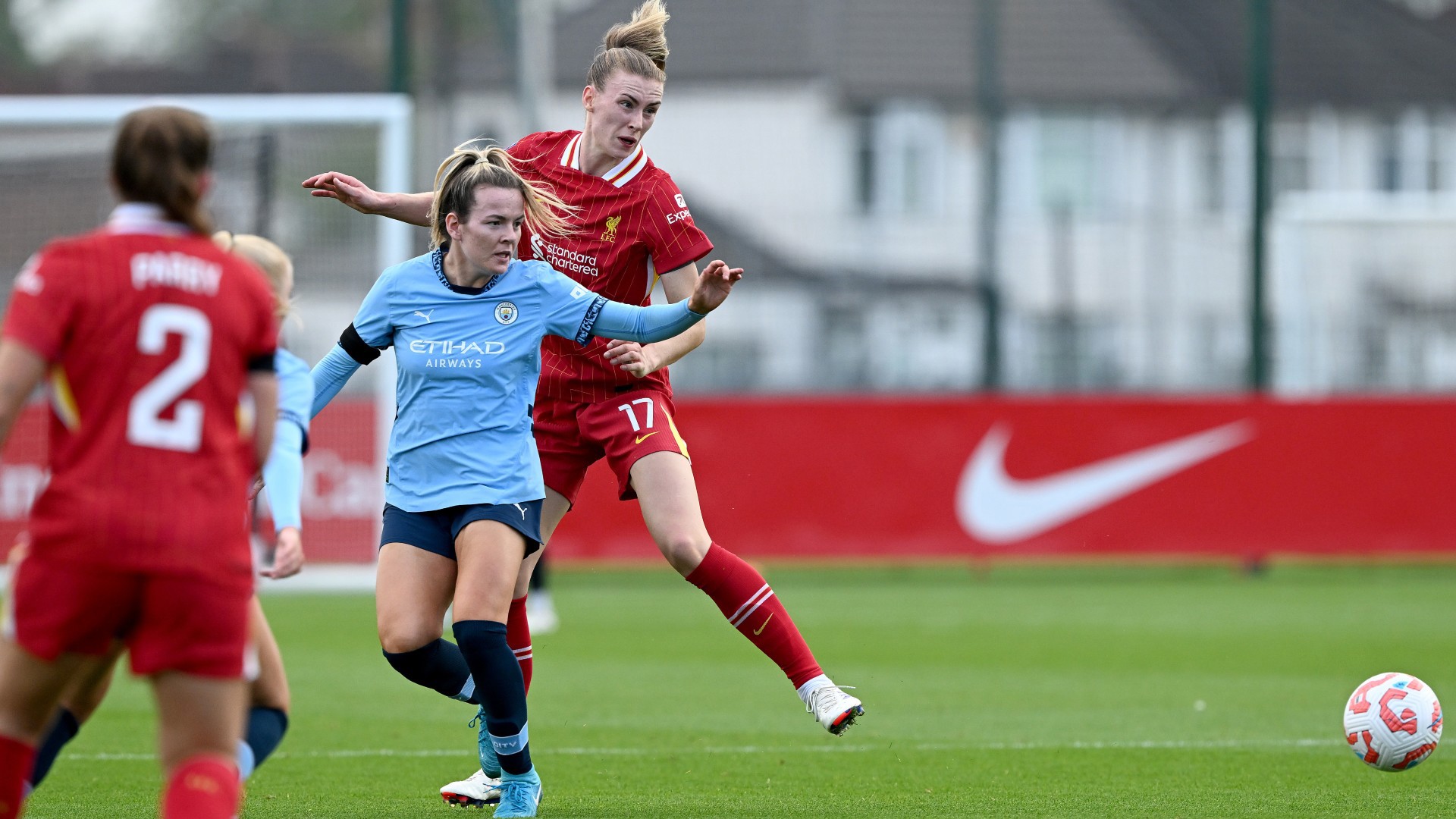 BATTLING HARD : Lauren Hemp challenges for the ball. Image credit: Nick Taylor / Liverpool FC