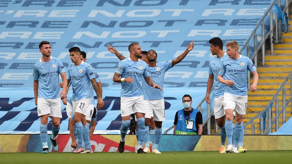 DEADLOCK BROKEN: The team celebrate Raheem's 100th City goal