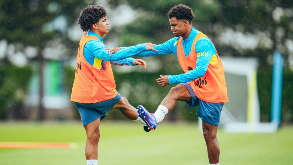 TWIST AND SHOUT  : Lewis and Bobb prepare for training. 