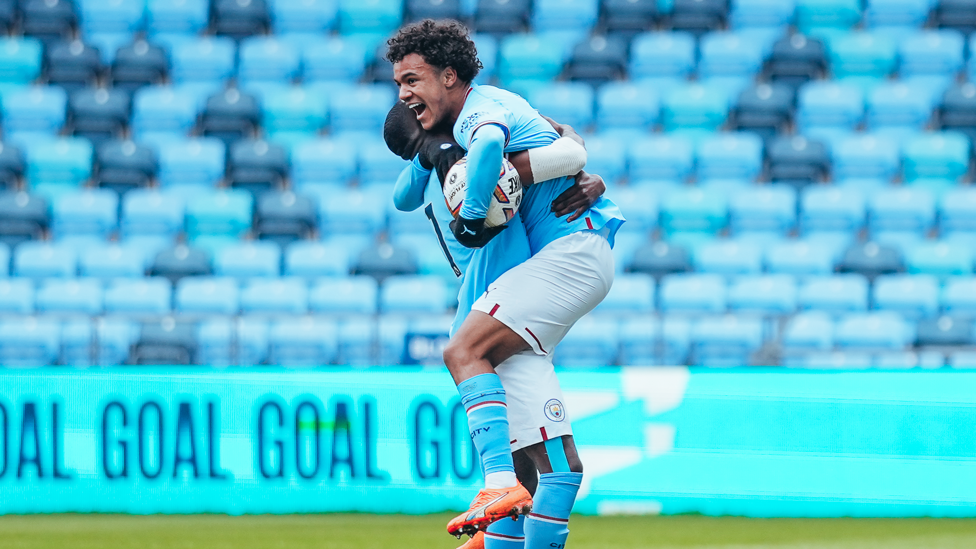 BUZZING BOBB : Oscar Bobb celebrates his opener against the Reds.