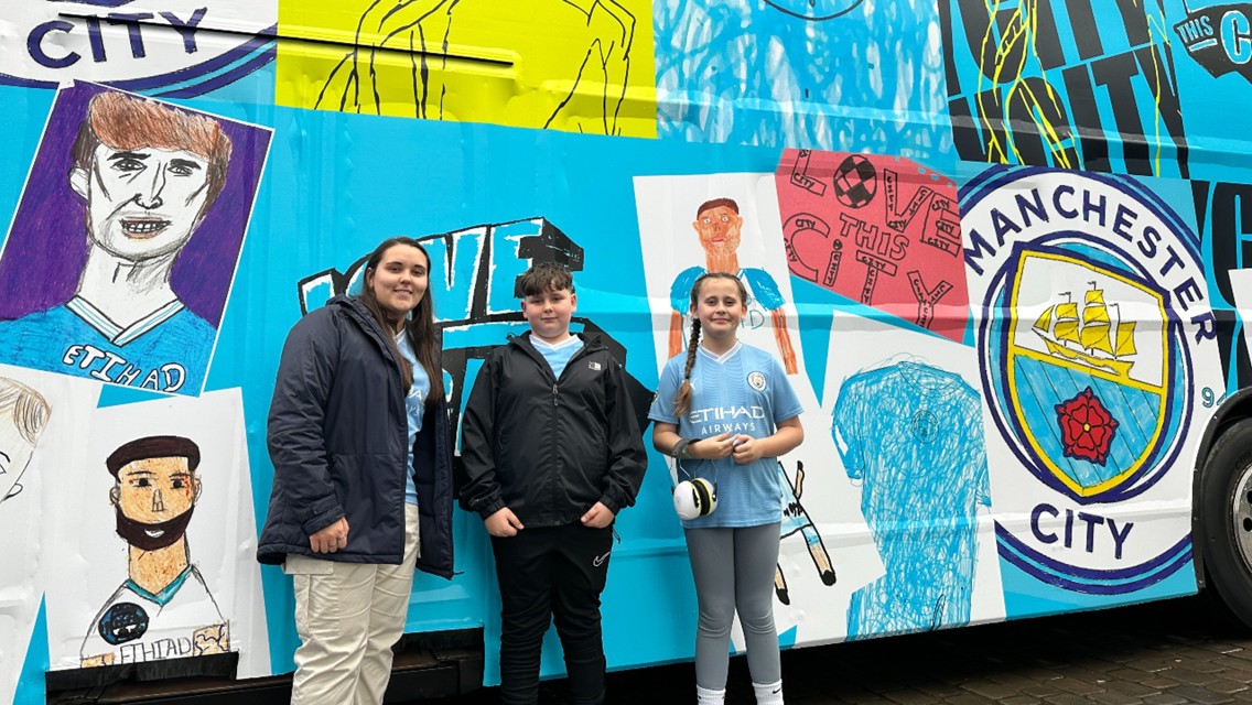 Manchester City celebrates CITC on Trophy parade bus