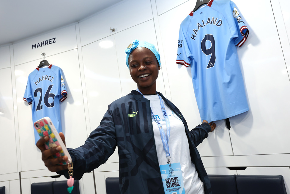 DREAMLAND : Sakina takes a selfie with her favourite player’s shirt in the dressing room 