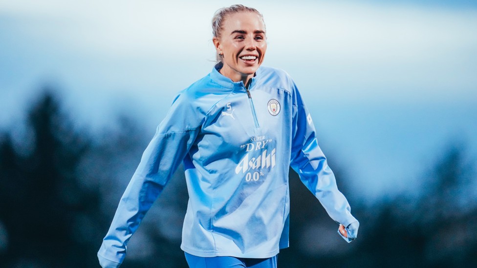 HIGH FIVE : Alex Greenwood is all smiles after the derby win