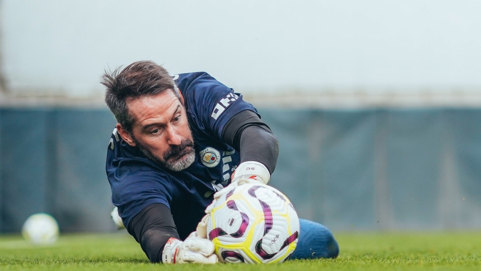 DOWN LOW : Scott Carson dives to make a stop