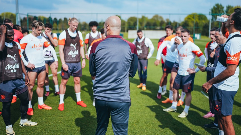 SQUAD GOALS : The team listen to Pep Guardiola's advice.